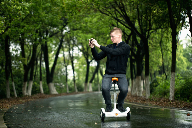 saddle equipped electric scooter